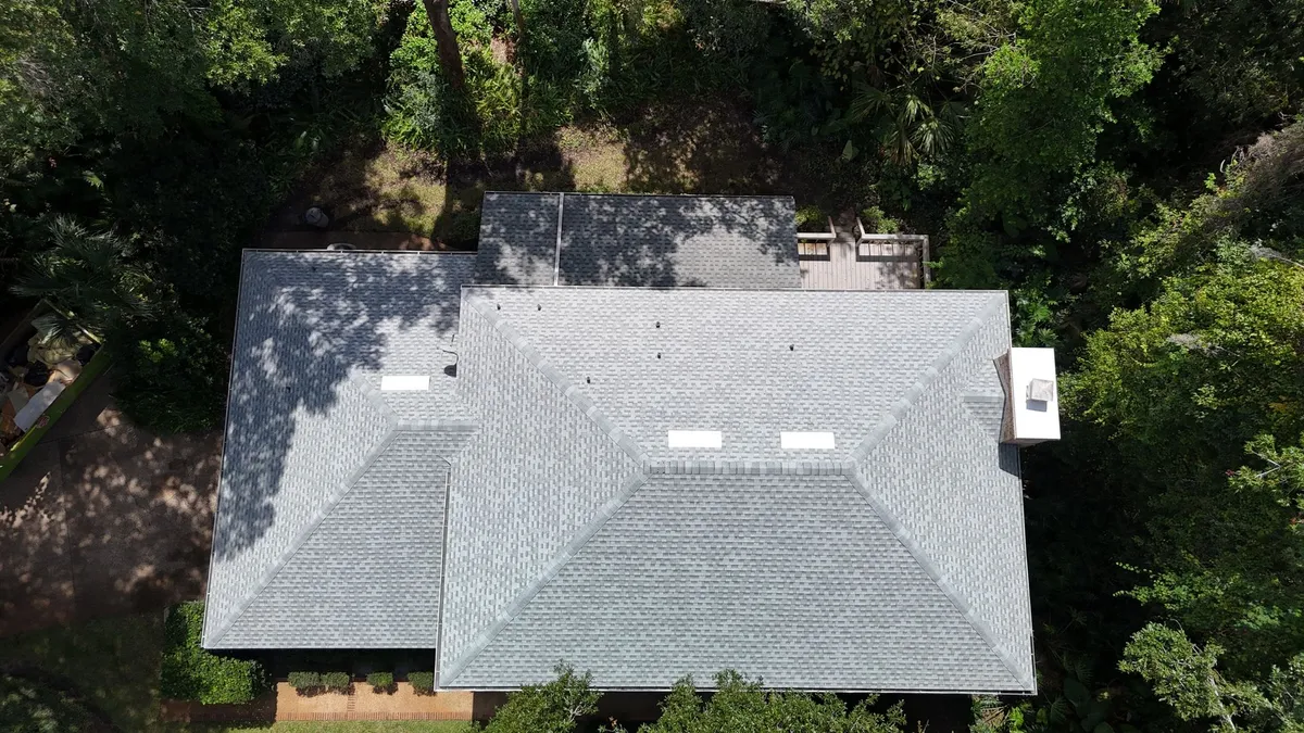 Gray shingle roof on brick home in Middleburg FL