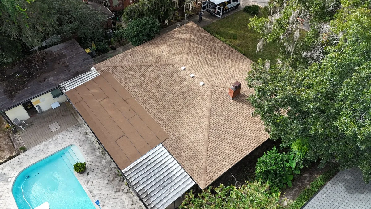 Aerial view of residential roof with pool in Fernandina Beach FL