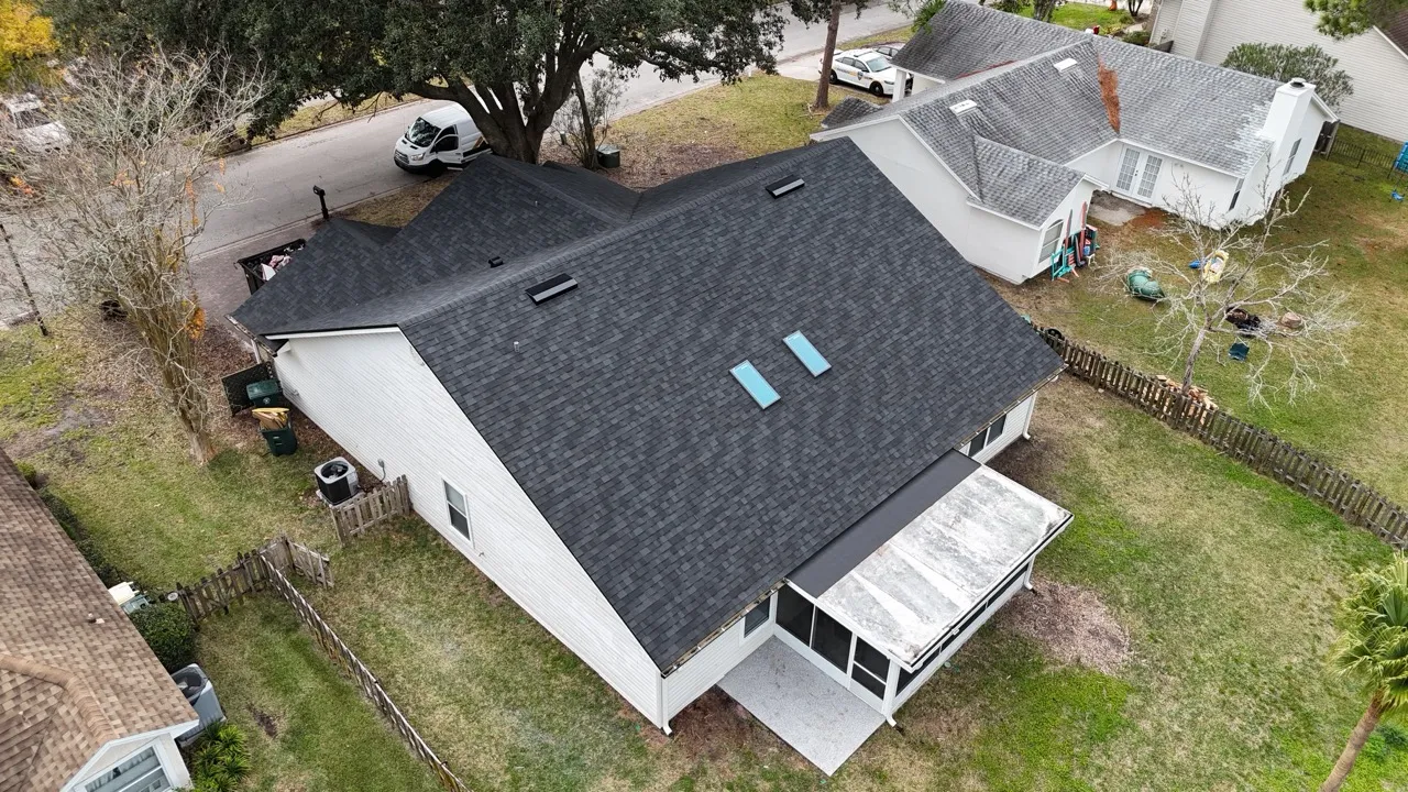 Drip Edge Installation: Essential Roof Edge Protection Aluminum drip edge flashing installed along the eave of a Florida shingle roof directing water into the gutter