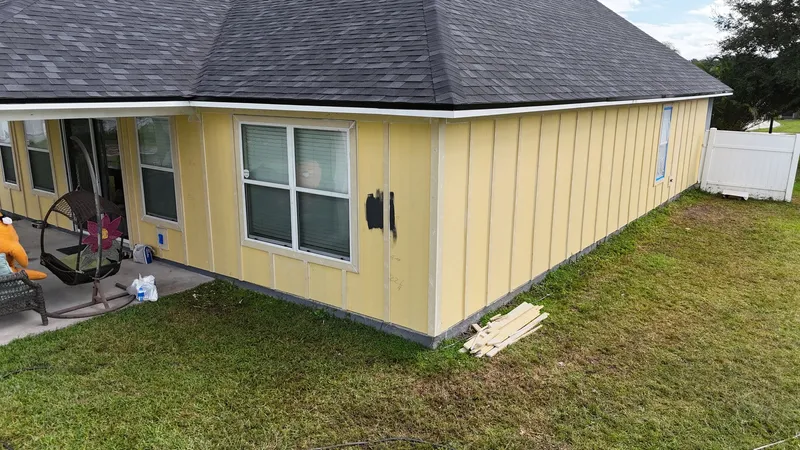 Yellow siding home renovation in Orange Park FL